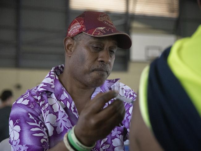 Medical staff administer the AstraZeneca vaccine in Boigu Island, which neighbours PNG. Picture: Getty Images