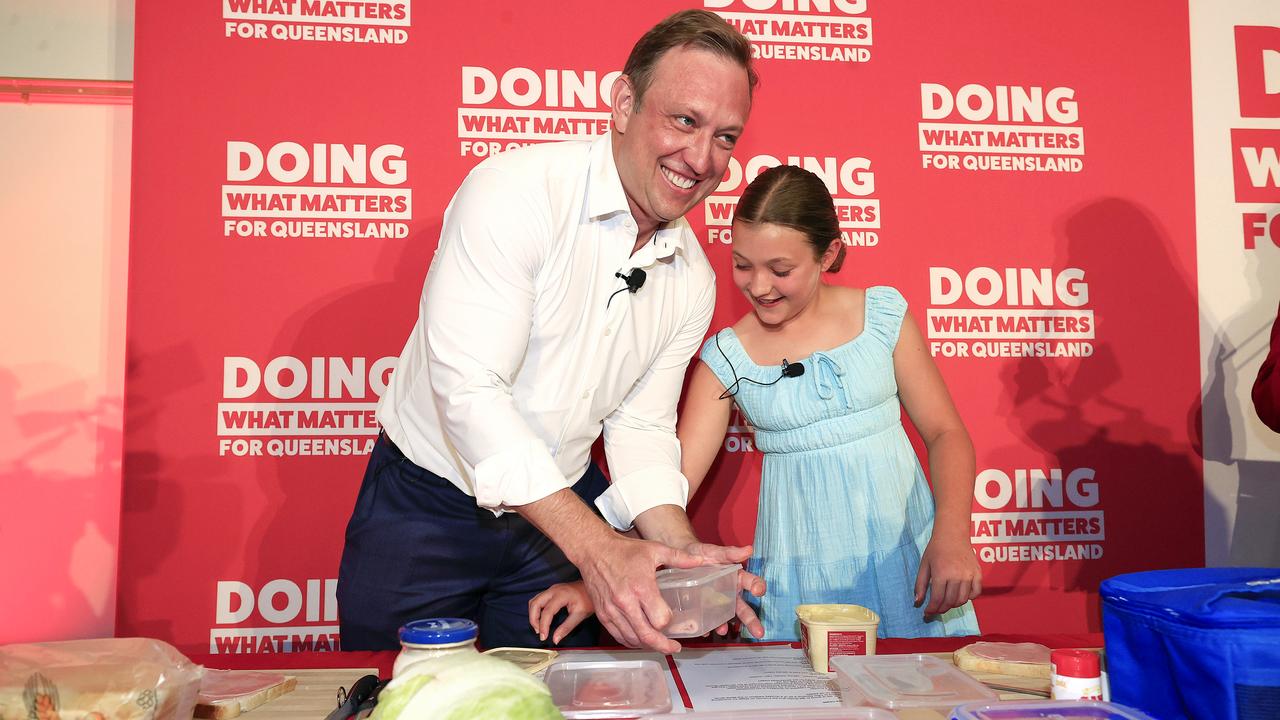 Premier Steven Miles making a sandwich with his daughter Bridie, 10, at the ALP launch. Picture: Adam Head