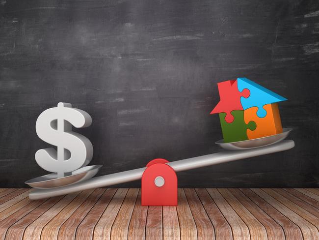 Seesaw Scale with Dollar Sign and Puzzle House on Chalkboard Background - 3D Rendering; housing wealth balance generic