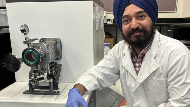 Dr Amandeep Singh Pannu, Research Fellow in the Charles Sturt University Rural Health and Research Institute in front of a tube furnace. Supplied