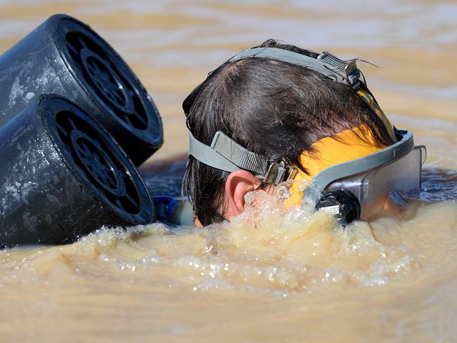 Police divers searched a farm dam on the outskirts of Muswellbrook last year. Picture by Peter Lorimer.