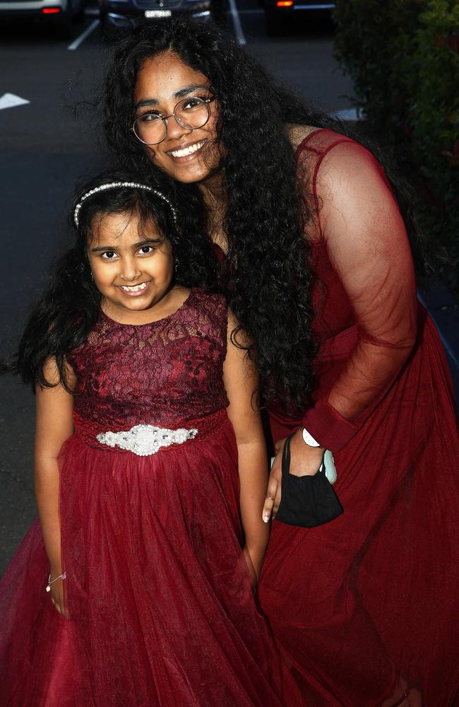 Right: Year 12 student Mondira Paul, with her ltiile sister Misheeta Paul -7. Picture: John Appleyard