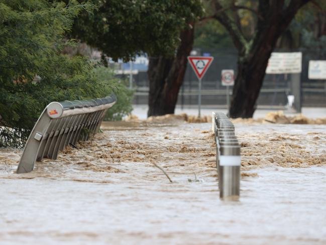 Traralgon floodwater cuts off roads and homes. Flood water from the Traralgon creek over Franklin Street.                      Picture: David Caird