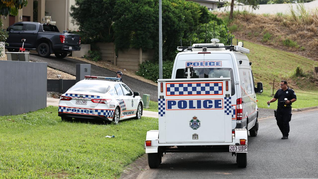 A Queensland Police mobile police facility van and trailer is set up at Verbena Street, Mt Sheridan, after the sudden death of a man and a woman, both aged 41, on Tuesday night. Picture: Brendan Radke