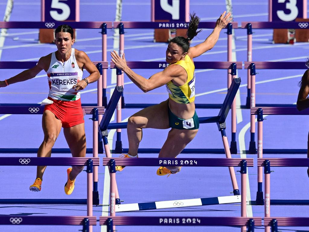 Jenneke falls in the women's 100m hurdles heat at the 2024 Olympic Games. Picture: Martin BERNETTI / AFP