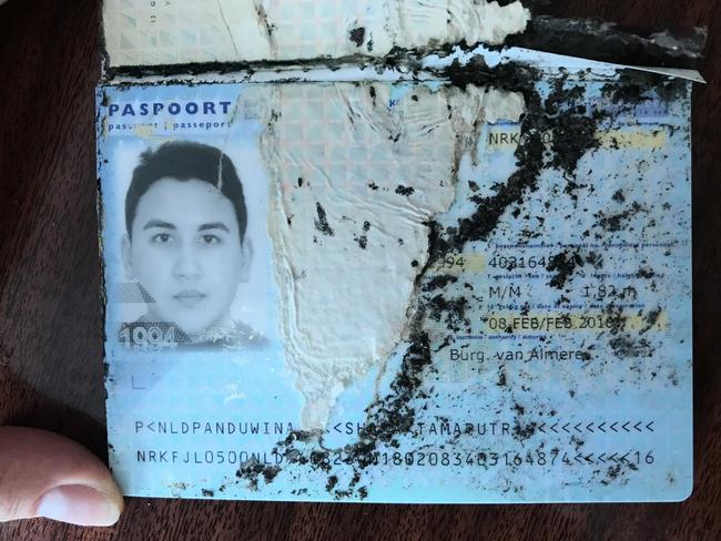 A passport found at the scene. Picture: Supplied to News Corp