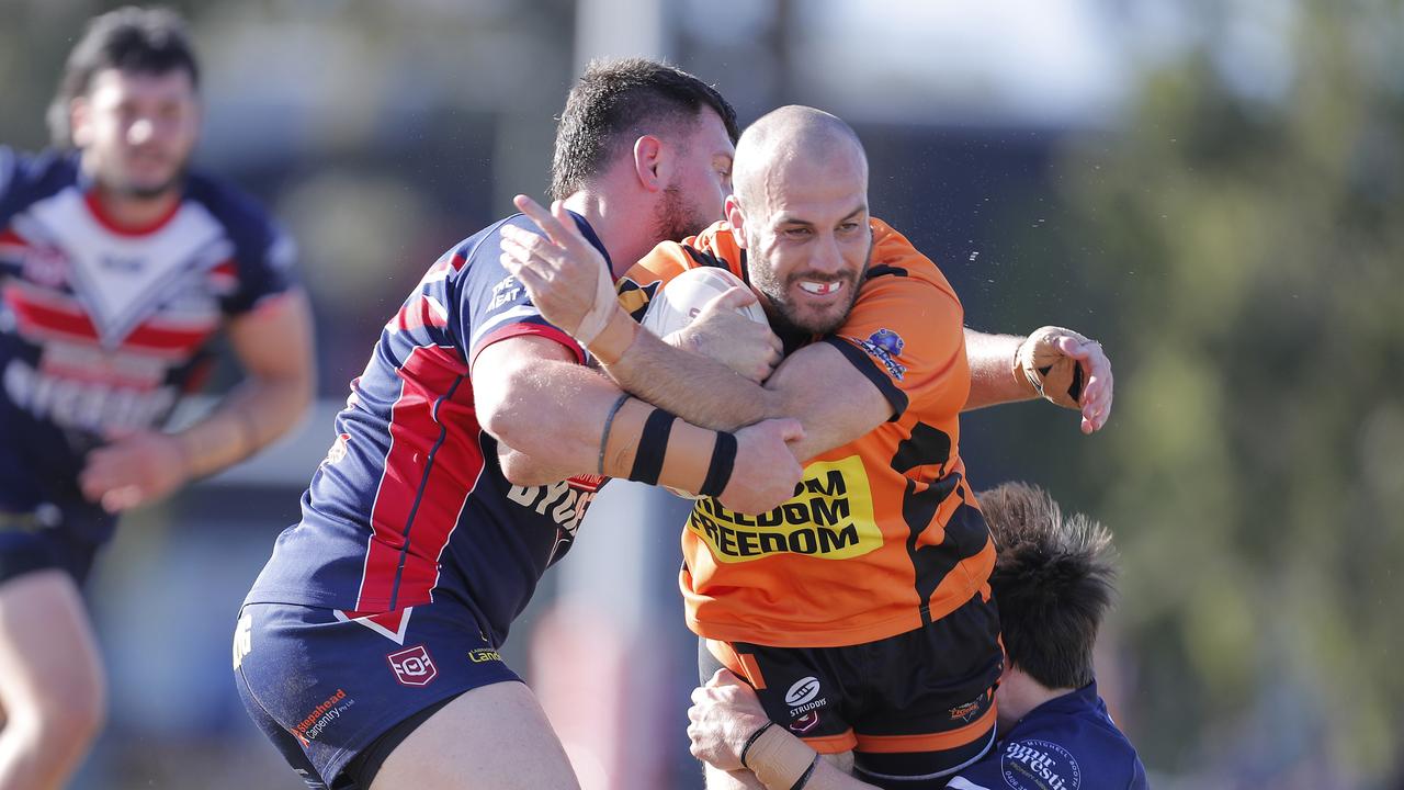 Michael Oldfield (centre) of the Southport Tigers. Photo: Regi Varghese