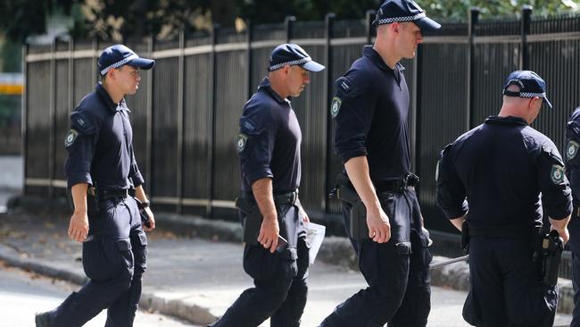 Police officers search the streets surrounding the home in Paddington of Jessie Baird and Luke Davies. Picture: NCA NewsWire / Gaye Gerard