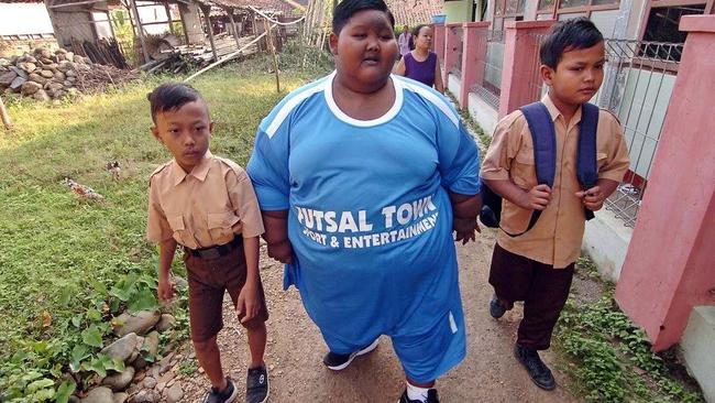 Arya Permana has made it back to school thanks to his new healthy eating and exercise regime. Picture: Caters