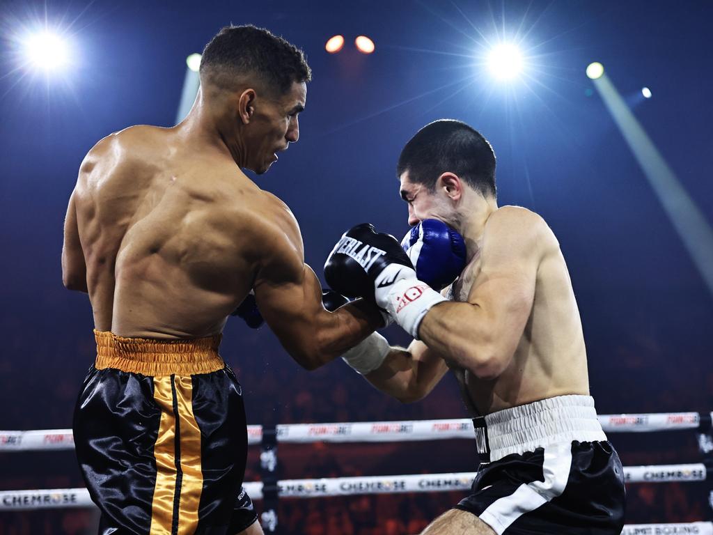 Mounir Fathi lands another big blow on Anton Markovic. Picture: No Limit Boxing/Gregg Porteous