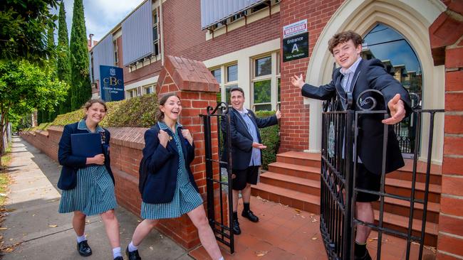 Gianfranco Forti and Nick Howard welcome Maddie Leroi and Darcy Lynch to their new school. Picture: Jason Edwards