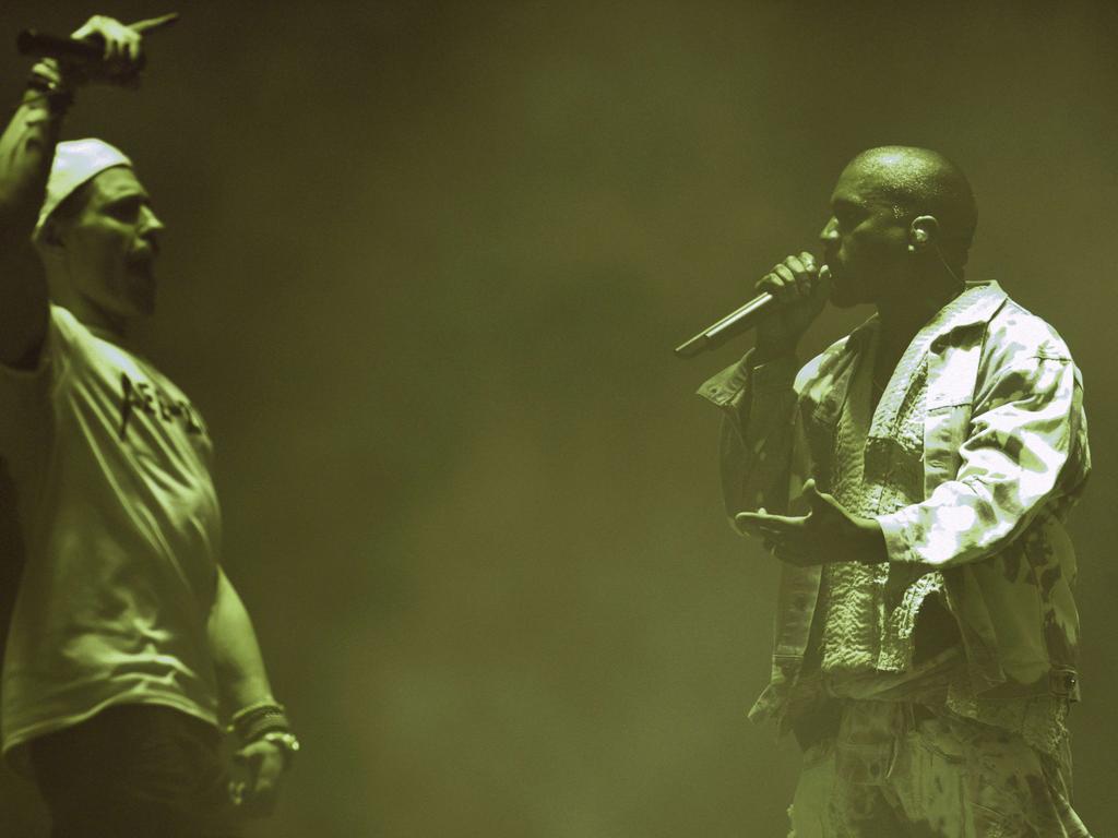 English comedian Simon Brodkin , playing his character Lee Nelson, interrupts American singer Kanye West as he performs at the 2015 Glastonbury Festival. Picture: AFP