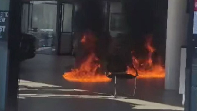 Mr Kelly allegedly set fire to the floor of the dealership. Picture: Channel 9