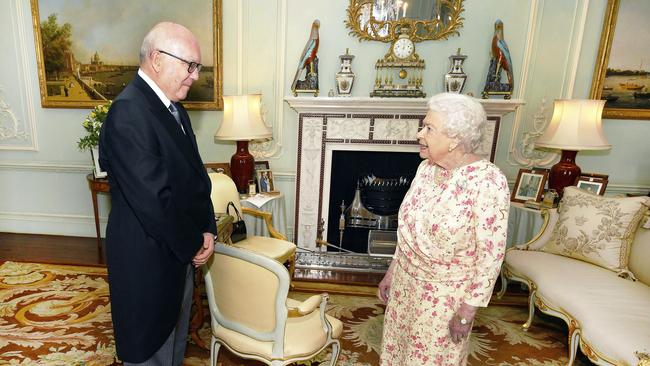 The Queen’s handbag signals important messages to her lady-in-waiting during her meeting with George Brandis. Picture: AP.