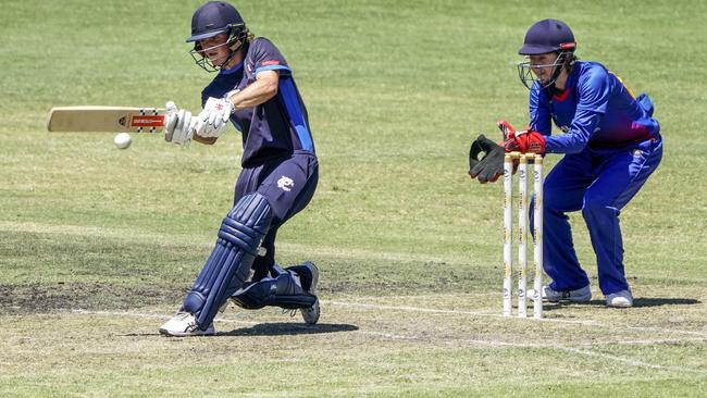 Oliver Will on the attack for Prahran, watched by Frankston Peninsula wickie Cooper Huggard. Picture: Valeriu Campan