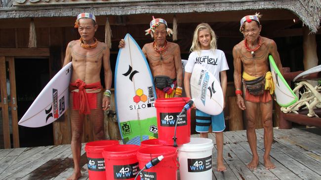 Winter Vincent with village elders in the Mentawai Islands in Indonesia in 2014. Picture: Mel Koeman