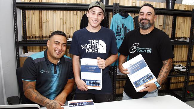 Joseph Te Puni-Fromont, left, with student Kaiden Martin-Fierro and Steve Henry, right, at their premises in Ormeau. Picture: Tertius Pickard