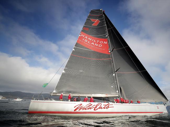 Wild Oats XI skippered by Mark Richards sails up the River Derwent on her way to a 9th line honours victory in the 2018 Sydney to Hobart Yacht Race. The yacht crossed the line in 1d 19hrs 7mins 21secs . Picture: RICHARD JUPE