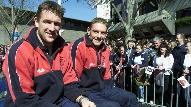 David Schwarz and Shane Woewodin during the 2000 AFL grand final parade. Picture: Graham Crouch