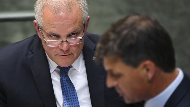 Prime Minister Scott Morrison listens to Energy Minister Angus Taylor during Question Time. Picture: AAP