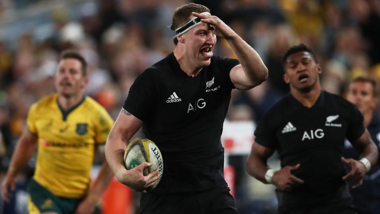 Brodie Retallick of the All Blacks runs away to score a try at ANZ Stadium.