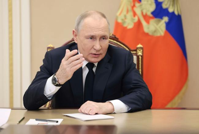 Russian President Vladimir Putin said 'neo-Nazis and terrorists' had crossed the border from Ukraine