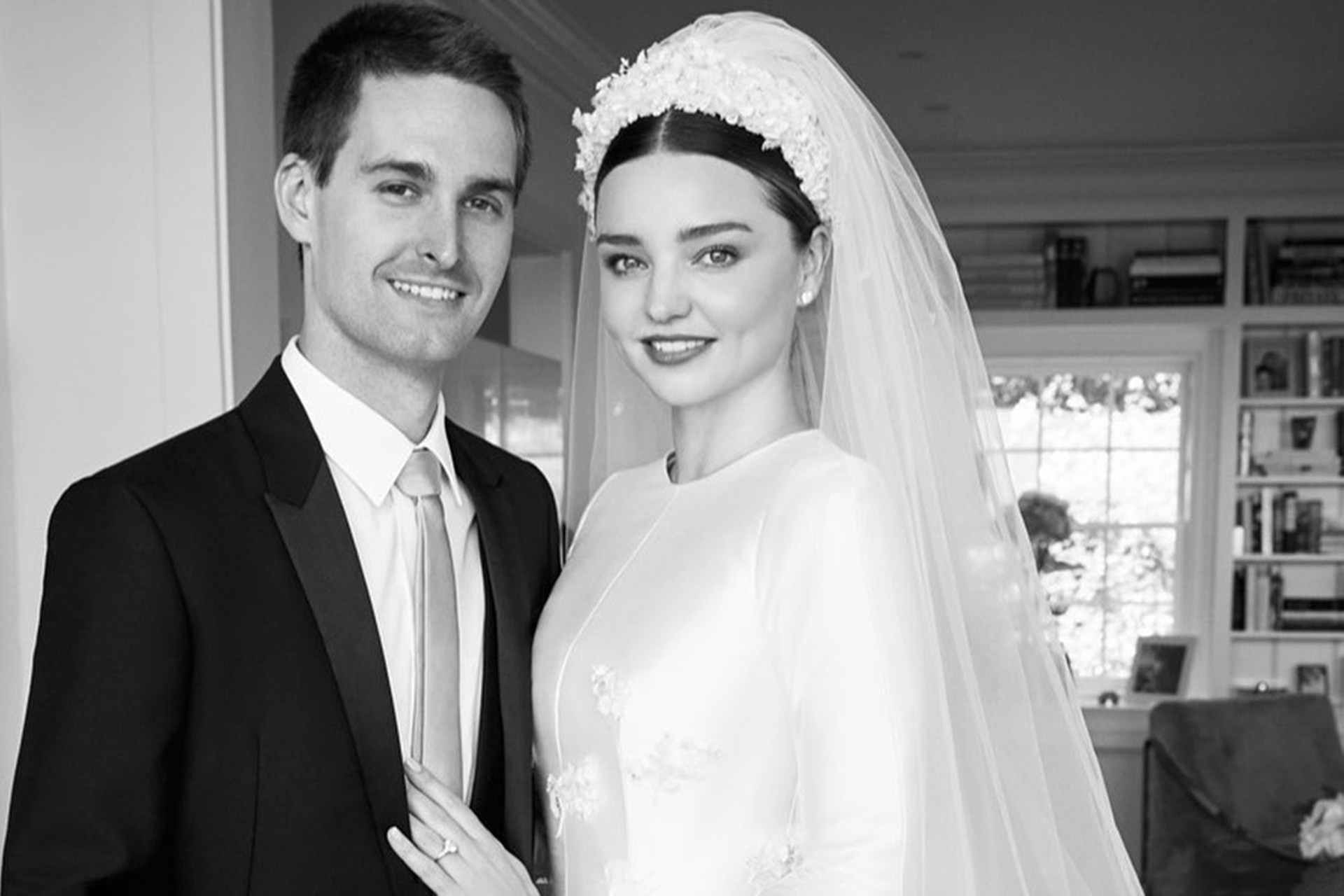 <p><em>Image credits: Instagram.com/mirandakerr</em></p><h2>Miranda Kerr in Dior</h2><p>In an intimate May ceremony back in 2017, Aussie icon and model Miranda Kerr married partner Evan Spiegel in their Los Angeles home. Kerr teamed up with newly appointed artistic director Maria Grazia Chiuri on a custom couture Dior wedding gown. Kerr was inspired by Grace Kelly&rsquo;s 1956 wedding to Prince Rainier of Monaco, mimicking the high neck, cinched waist and puffed skirt. Her headpiece was designed by Christian Dior&rsquo;s milliner Stephen Jones, which created a modest and elegant statement both with and without the veil.</p>