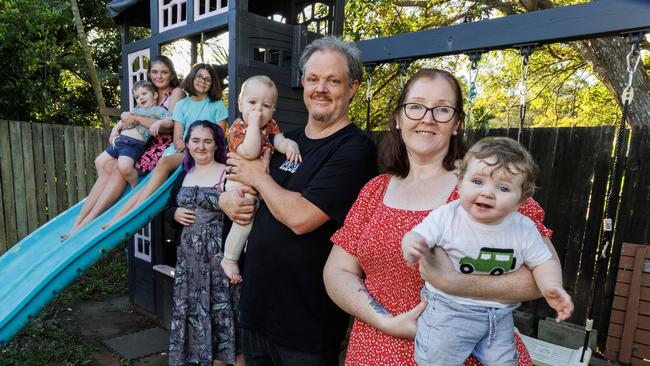 Kallangur mum Belinda Rahe who has been diagnosed with neuroendocrine cancer in her pancreas, pictured at home with husband Wayne and children Henry 2, Savannah 12, Genevieve 9, Charlotte 19, grandson Theodore and George 9 months. Theodore. Picture Lachie Millard