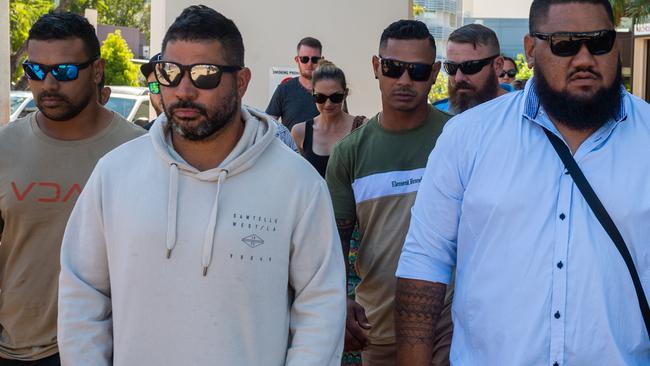 Daniel Mark Keelan (grey jumper) leaves Darwin local court with his posse after being charged with drug offences.