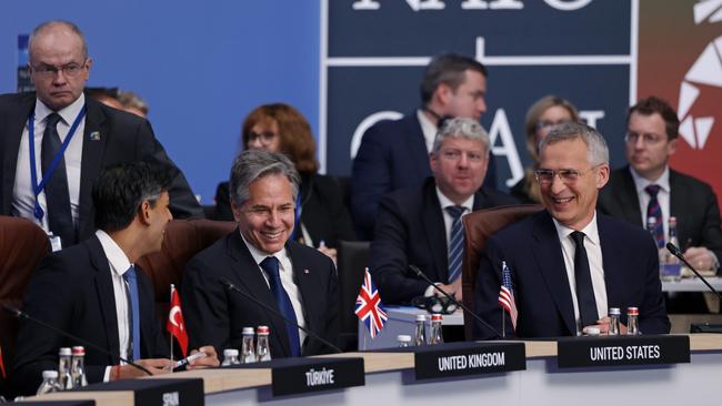 Rishi Sunak (L), US Secretary of State Anthony Blinken (C) and NATO Secretary General Jens Stoltenberg (R) attend the second day of the 2023 NATO Summit.