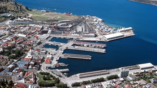 Aerial photo of the Hobart wharf area taken in 1960, showing the floating bridge, the breakwater, railway yards, oil wharf etc. Photo by Geoff Harrisson, supplied for the Mercury TasWeekend blast from the past column