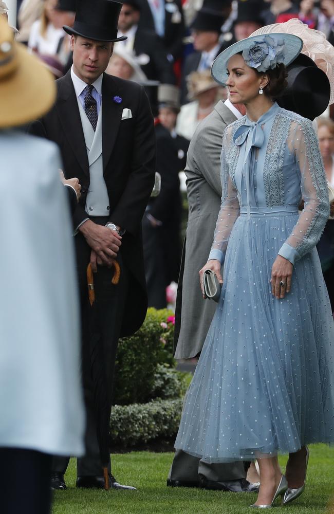 Kate and William looked glamorous on a rainy first day of the annual race meet, 40 kilometres west of London. Picture: AP Photo/Alastair Grant