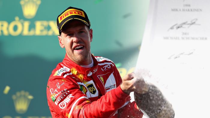 MELBOURNE, AUSTRALIA - MARCH 26: Sebastian Vettel of Germany and Ferrari celebrates his win on the podium during the Australian Formula One Grand Prix at Albert Park on March 26, 2017 in Melbourne, Australia. (Photo by Mark Thompson/Getty Images)