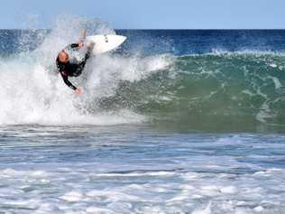 Surfers and bodyboard riders making the most of the waves at Kawana on the weekend. Picture: Mark Furler