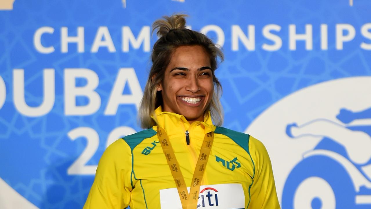 Madison de Rozario with her gold after winning the 100m T47 final race at the IPC World Para Athletics titles in Dubai.