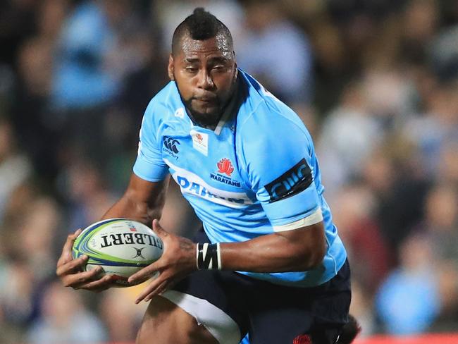 Waratahs winger Taqele Naiyaravoro runs the ball.