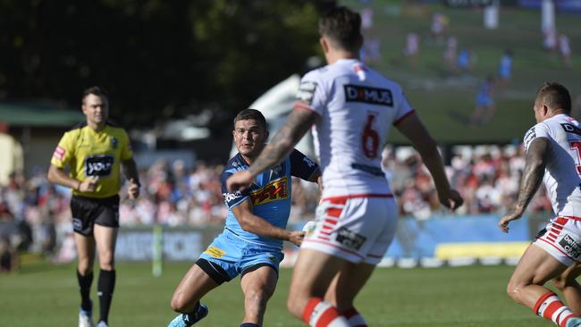 Ash Taylor fires off a pass during the Gold Coast Titans clash with St George Illawarra Dragons in NRL round 3 at Clive Berghofer Stadium, 2018.