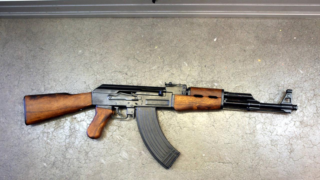 Police alleged text messages suggest Cross had been in possession of an AK-style rifle (similar to the replica pictured) and that the weapon may have been bartered for meth.