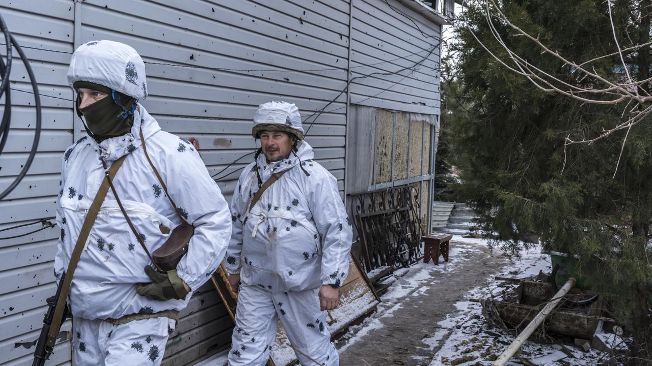 Ukrainian soldiers with the 56th Brigade, in a trench on the front line on January 18, 2022 in Pisky, Ukraine. Picture: Brendan Hoffman/Getty Images.