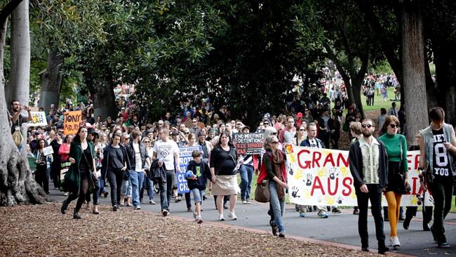 Thousands take to Melbourne streets to protest against Abbott ...