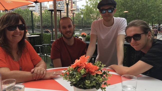 Maria Morgan with sons Conor, Sean and Finn, their father is stuck overseas because of caps on overseas