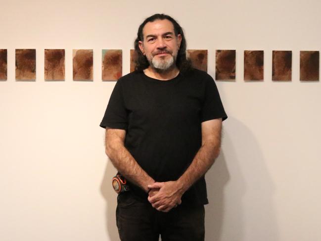 Khaled Sabsabi with his works at Mosman Art Gallery