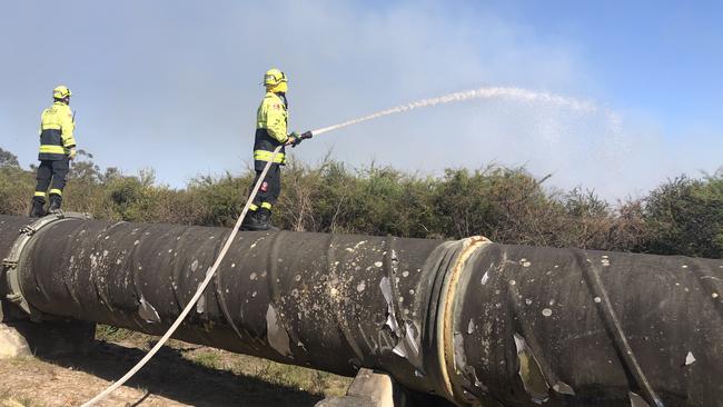 One of the fires came close to the main Sydney Water pipeline to the northern beaches. Picture: Jim O’Rourke