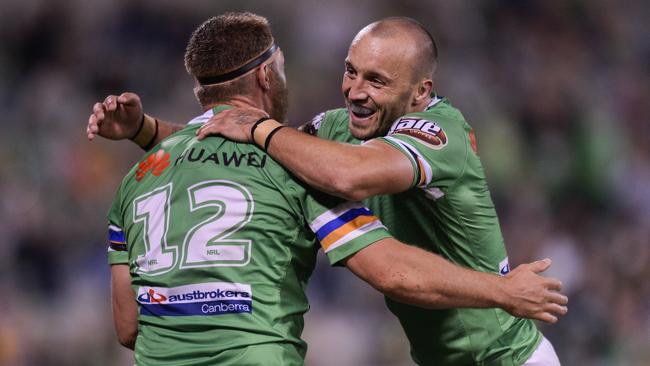 Elliot Whitehead celebrates a try with Raiders teammate Josh Hodgson. Picture: AAP