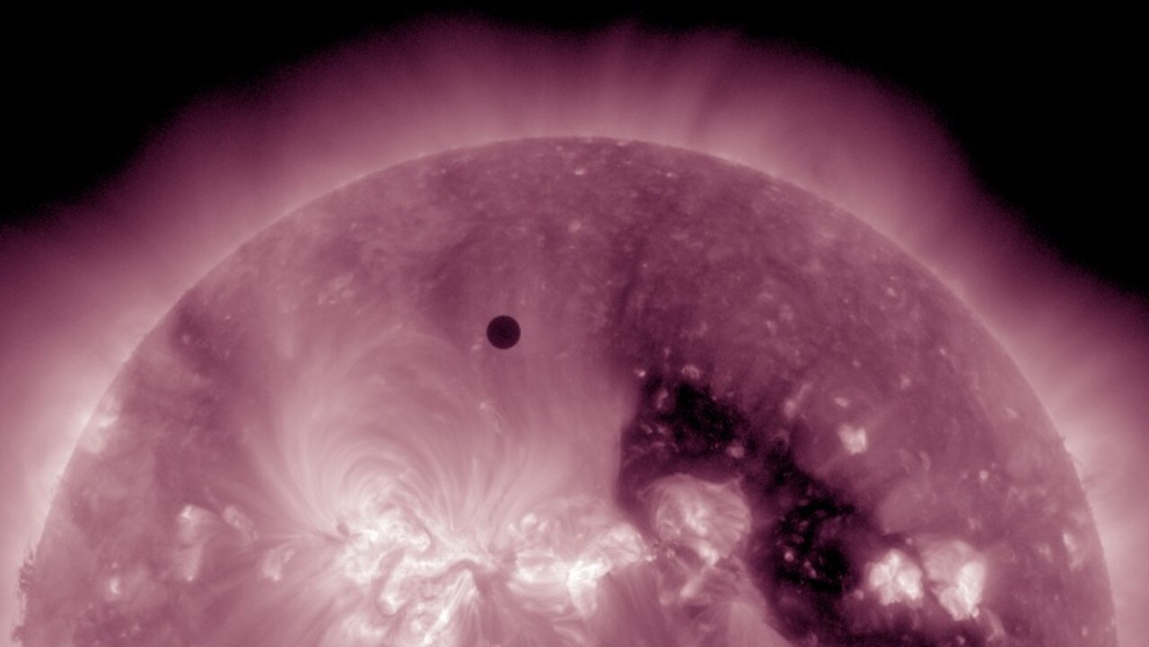 View of the planet Venus seen in transit across the Sun.