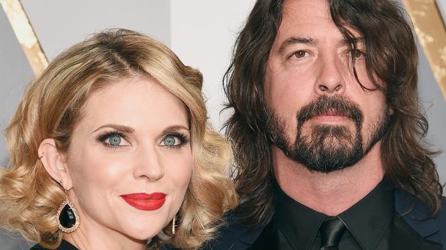 HOLLYWOOD, CA - FEBRUARY 28: Musician Dave Grohl (R) and Jordyn Blum attend the 88th Annual Academy Awards at Hollywood & Highland Center on February 28, 2016 in Hollywood, California. (Photo by Kevork Djansezian/Getty Images)