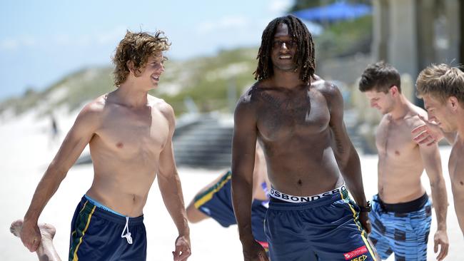 Nat Fyfe and Nic Naitanui warm up on Cottesloe Beach. Picture: Alf Sorbello