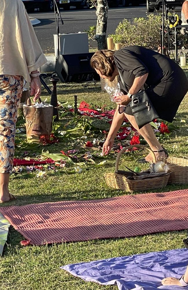 Ballina Mayor Sharon Cadwallader laying flowers at Lindy Lucena’s memorial.