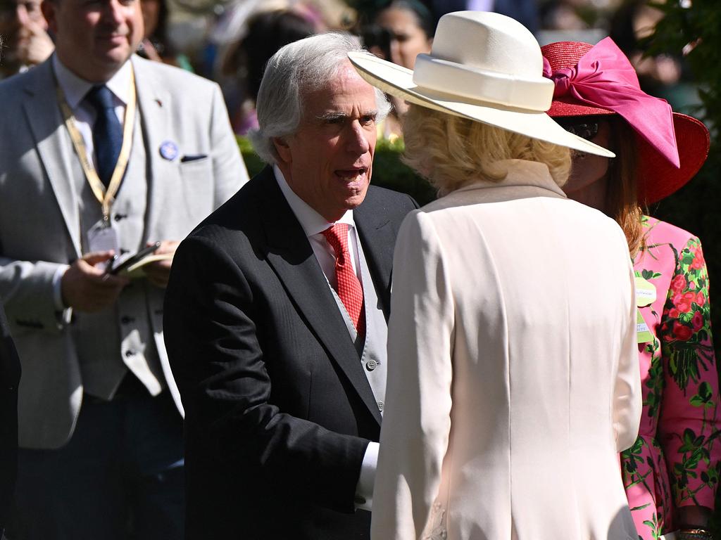 US actor Henry Winkler meets Britain's Queen Camilla on the fifth day of the Royal Ascot horse racing meeting. Picture: AFP