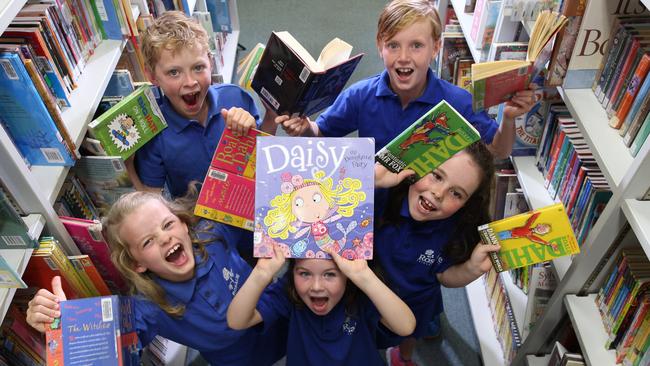Rosalie Primary School principal Ros Kay with students reading. The school are running a special "reading buddy program" in 2016. Abbie May 5 (centre front) Ruby Phillips 8 (blond) Jessica May 8 (brunette) (left to right) Alastair Phillips 10 Monty smith 10 Ros Kay (principle) Louise May (teacher)